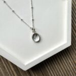 Silver necklace with topaz