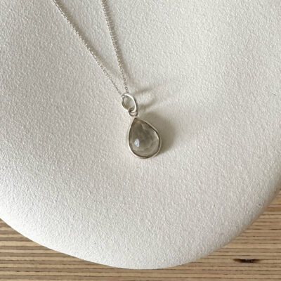 Silver necklace with pear shaped Topaz