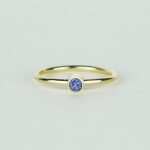 Handmade 14K gold ring with round tanzanite, birthstone of December