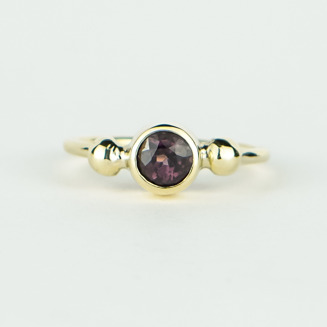 gold ring with spinel Handmade 14 karat gold ring with burgundy spinel and ball details